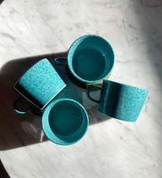 Blue speckled mugs