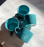 Blue speckled mugs