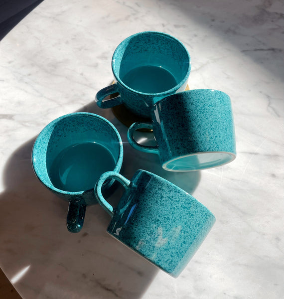 Blue speckled mugs