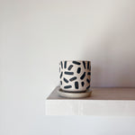 Black and white plant pot